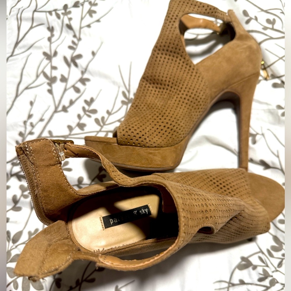 Dry high mule like open toed heels. Only could wear once going out!